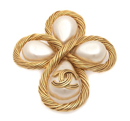 A Chanel Faux Pearl Brooch.