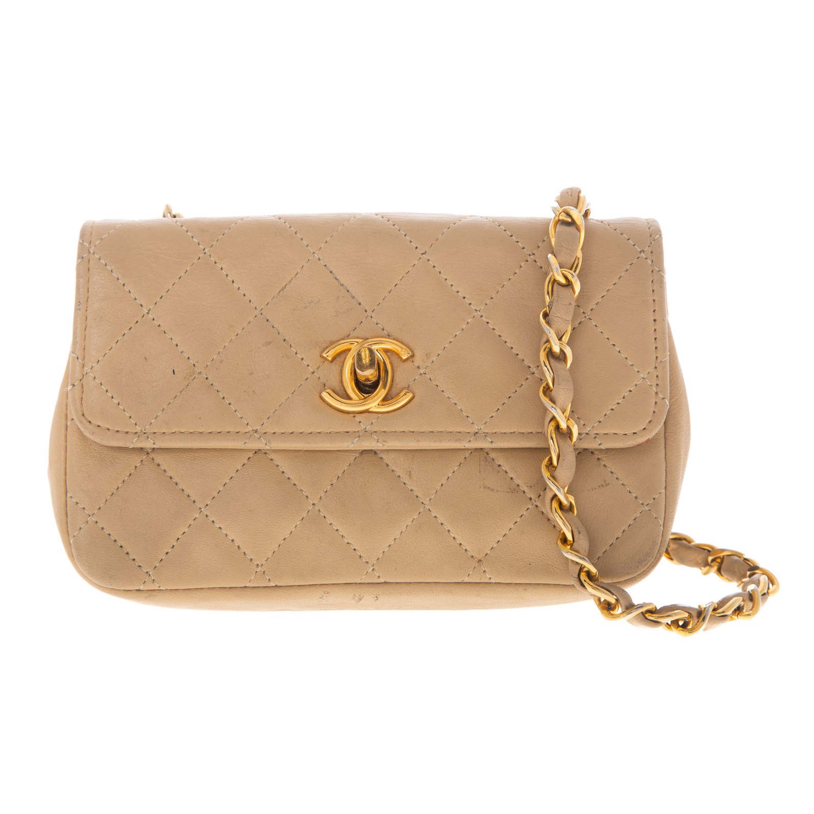 A CHANEL MINI QUILTED FLAP BAG A