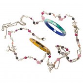 A CHANEL NECKLACE WITH TWO LOU