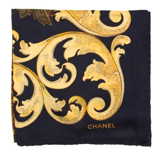 A Chanel Silk Scarf in a
