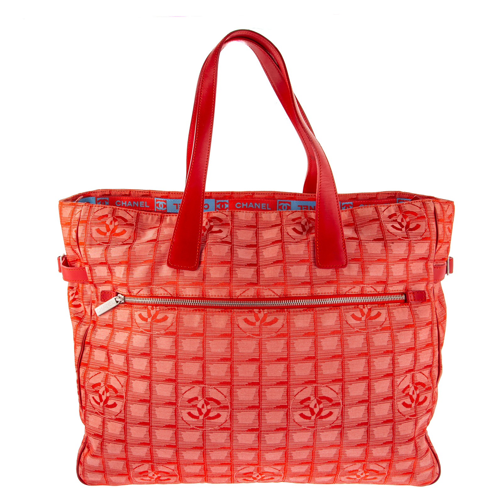 A CHANEL TRAVEL LIGNE TOTE A red