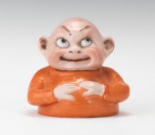 A Character Waist-Up Figural o
