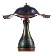 A CHARLES LOTTON PEACOCK FEATH