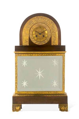 A CHARLES X BRONZE AND GLASS MANTEL