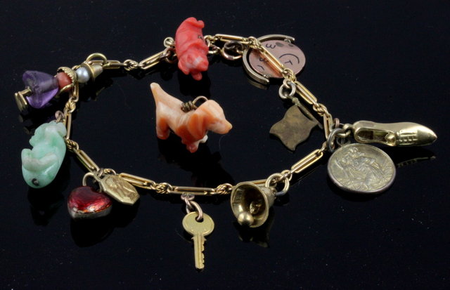 A charm bracelet hung a variety