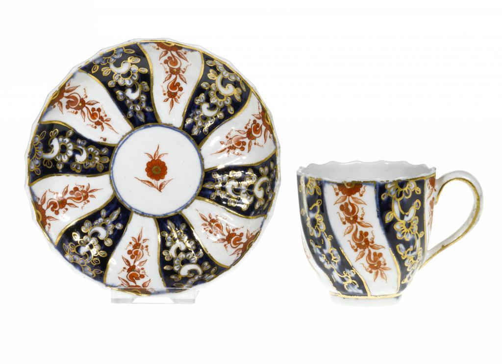 A CHELSEA-DERBY COFFEE CUP AND
