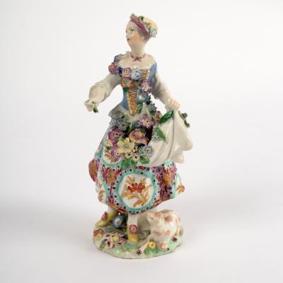 A Chelsea figure of a shepherdess