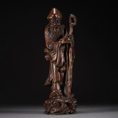 A CHENXIANG WOOD CARVED FIGURE