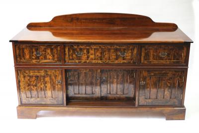 A cherry and pear wood sideboard,