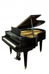 A CHICKERING BABY GRAND PIANO