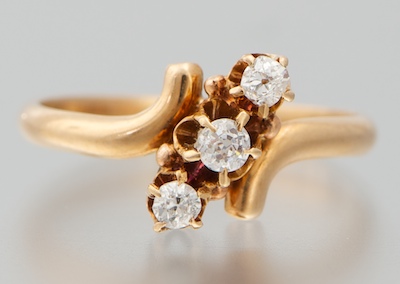 A Child's Diamond Ring 14k yellow