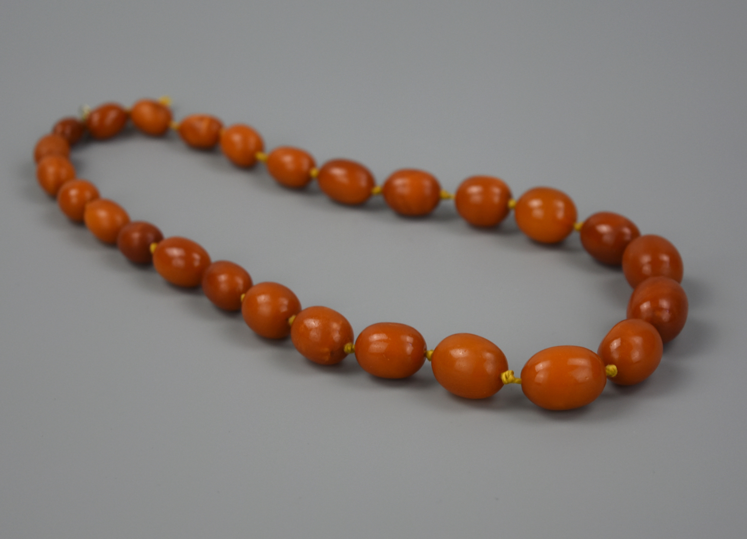 A CHINESE 27 BEED BEESWAX