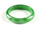 A CHINESE APPLE GREEN JADEITE