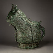 A CHINESE ARCHAIC BRONZE WINE