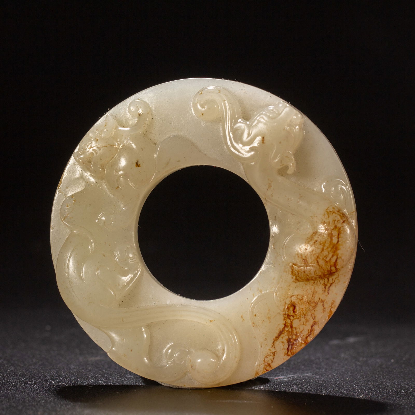 A CHINESE ARCHAISTIC CARVED JADE
