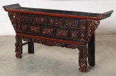 A CHINESE BLACK AND RED PAINTE
