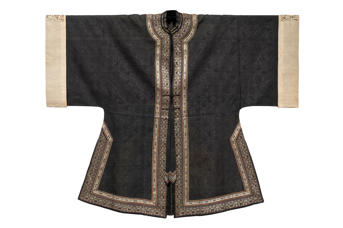 A CHINESE BLACK GROUND BROCADE