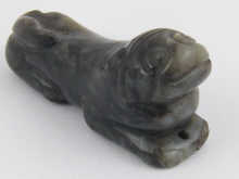 A Chinese black jade carving of a