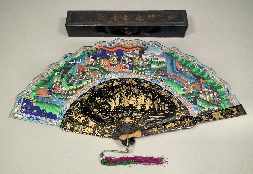 A Chinese black lacquered fan the