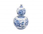 A CHINESE BLUE AND WHITE DOUBL