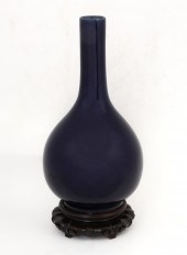 A CHINESE BLUE GLAZED STICK NE