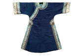 A CHINESE BLUE GROUND SATIN IN