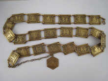 A Chinese brass belt decorated with