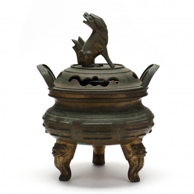 A CHINESE BRONZE COVERED CENSER 