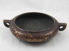 A Chinese bronze ''gold splash''