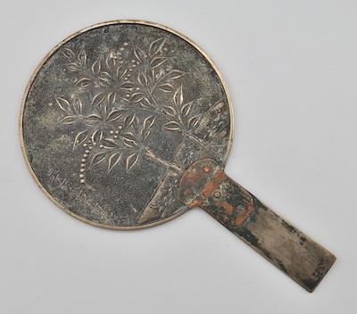 A Chinese Bronze Hand Mirror The