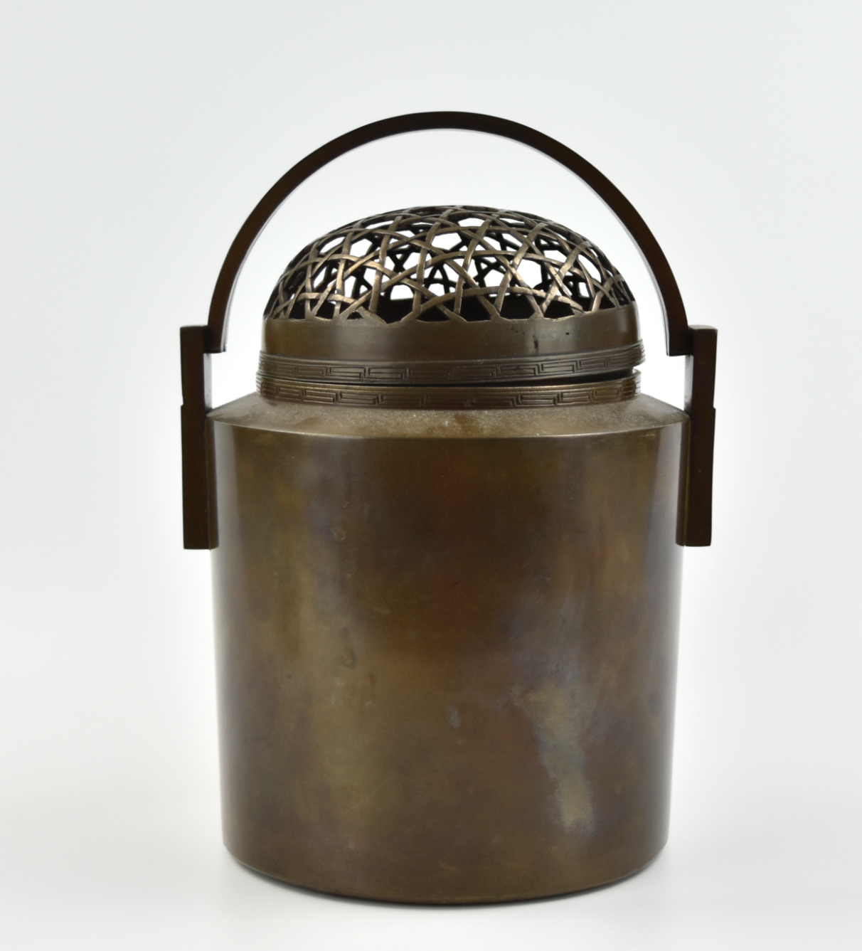 A CHINESE BRONZE HAND WARMER,