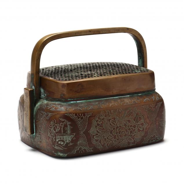 A CHINESE BRONZE HAND WARMER 
