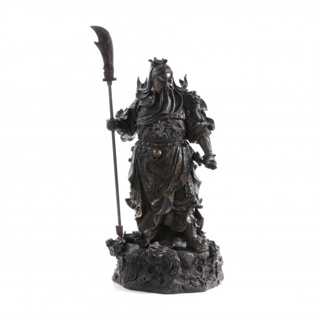 A CHINESE BRONZE SCULPTURE OF