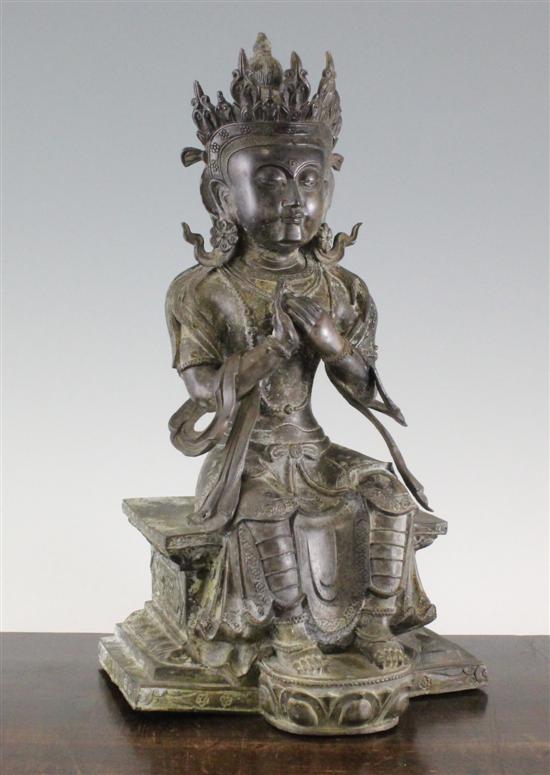A Chinese bronze seated figure of a