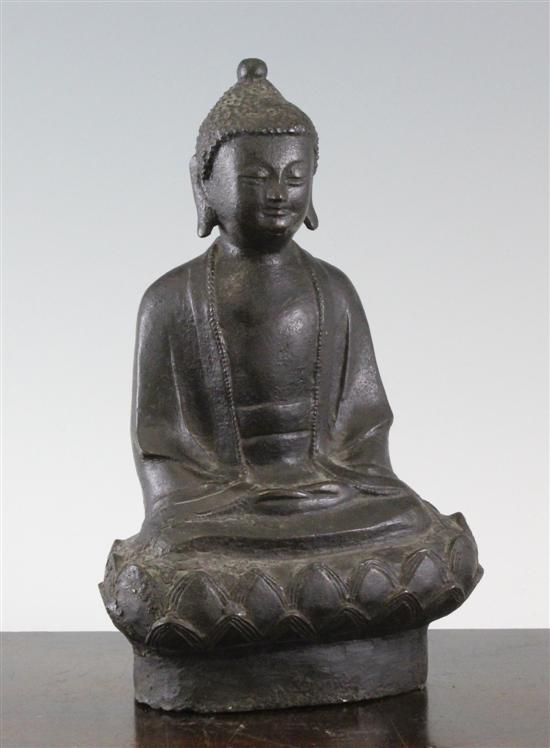 A Chinese bronze seated figure of