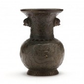 A CHINESE BRONZE VASE WITH FRO
