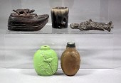 A Chinese brown agate oval snu