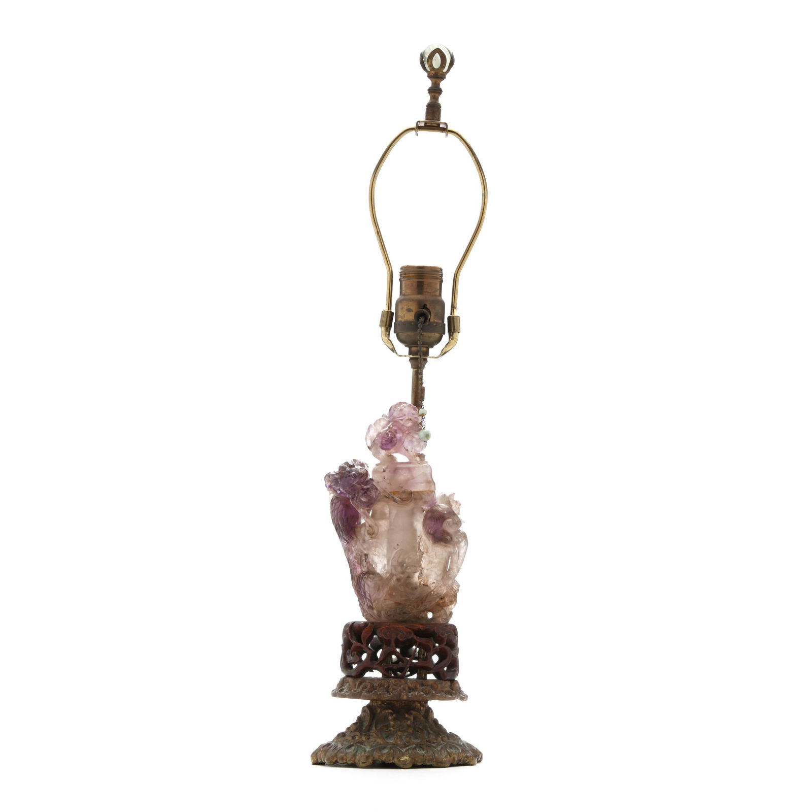 A CHINESE CARVED AMETHYST COVERED