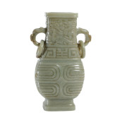 A CHINESE CARVED ARCHAIC FORM