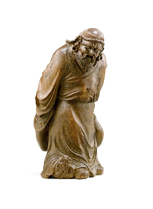 A Chinese carved bamboo figure of