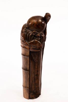 A Chinese carved bamboo figure of