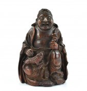 A CHINESE CARVED BAMBOO FIGURE