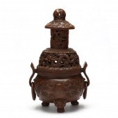 A CHINESE CARVED BAMBOO TIERED