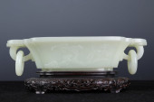 A CHINESE CARVED BATS JADE BRU