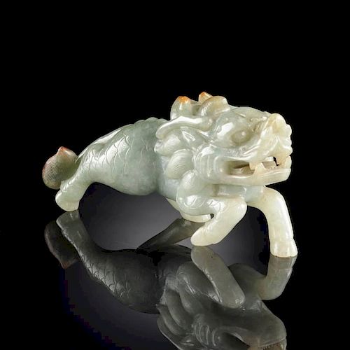 A CHINESE CARVED CELADON JADE