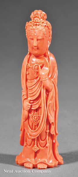 A Chinese Carved Coral Figure of