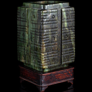 A Chinese Carved Green Jade Cong