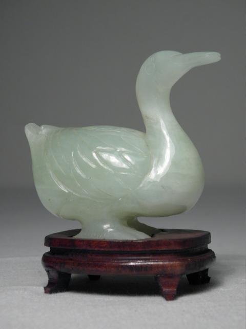 A Chinese carved green Nephrite