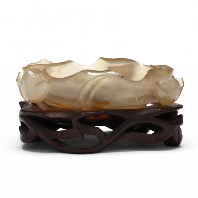 A CHINESE CARVED HARDSTONE BRUSH