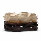 A CHINESE CARVED HARDSTONE BRU